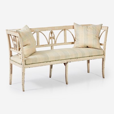 Lot 19 - A Northern European Cream-Painted Carved Wood Sofa
